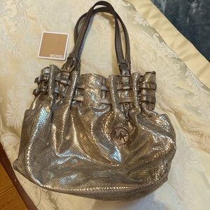 Michael Kors Leather large pale metallic gold “Reptile “ purse